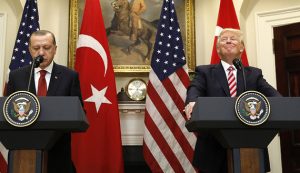 Turkey's President Recep Tayyip Erdogan (L) and U.S President Donald Trump deliver statements to reporters in the Roosevelt Room of the White House in Washington, U.S. May 16, 2017. REUTERS/Kevin Lamarque - RTX363IZ