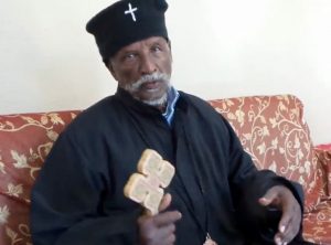 Patriarch Antonios holding cross