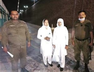 Mariam Lal and Nawish Arooj being taken into custody