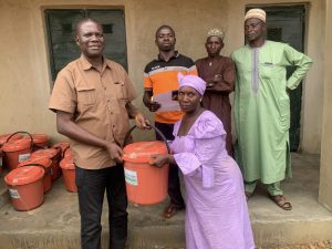 Bucket being handed over