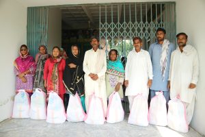 Group with bags of aid