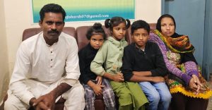Shaukat Masih and Kiran Shaukat with their children