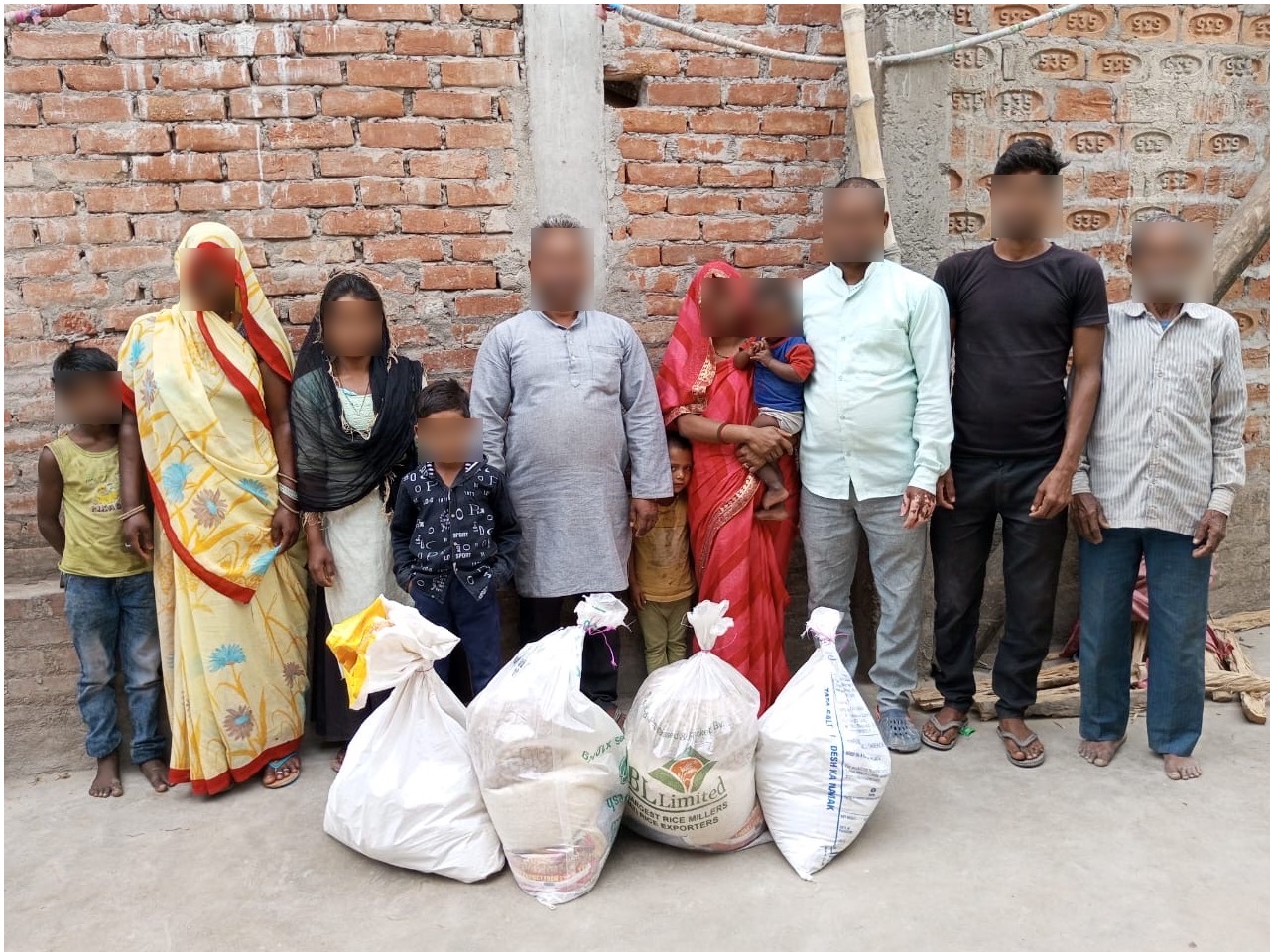 Family with Aid Bags