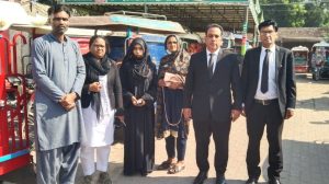 Diya Iftikhar with her parents and lawyers