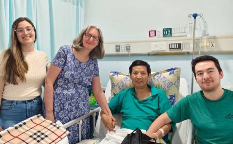John Cao (Hospital with family – Horiz)